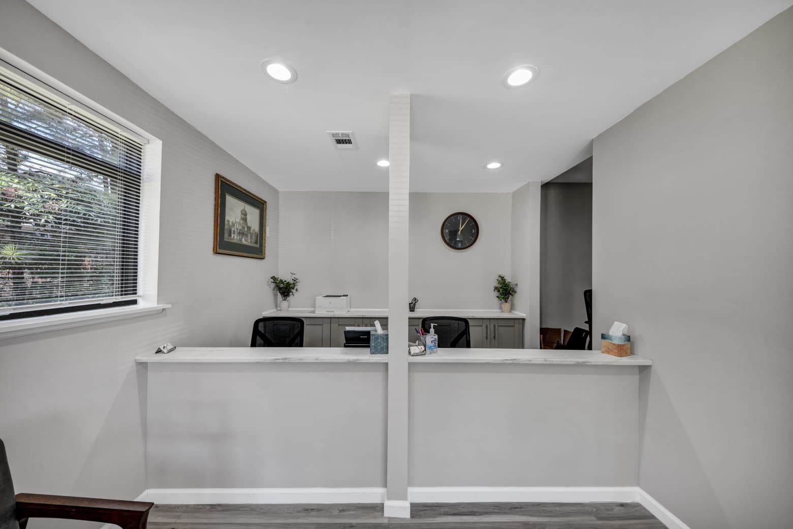 Reception and check-in counter at local Austell clinic for primary care doctor near me